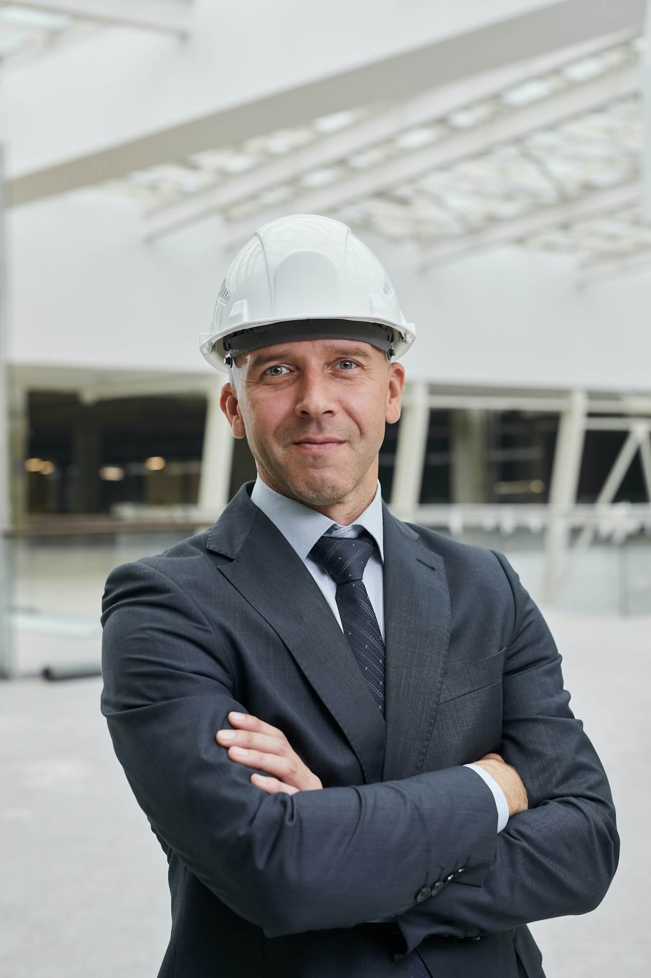 confident-businessman-at-construction-site-1